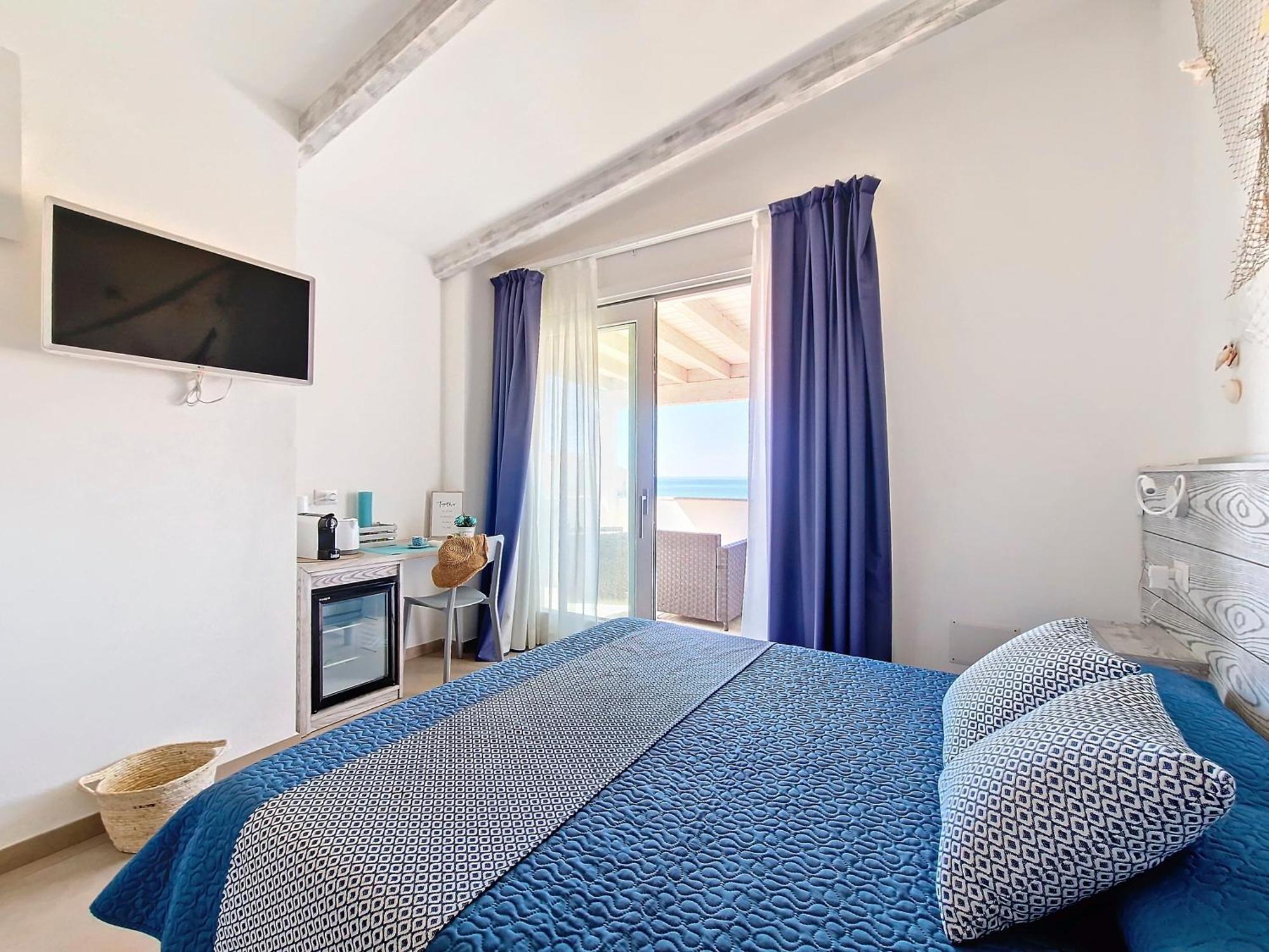 L'Onda Marina Hotel Кастелсардо Екстериор снимка